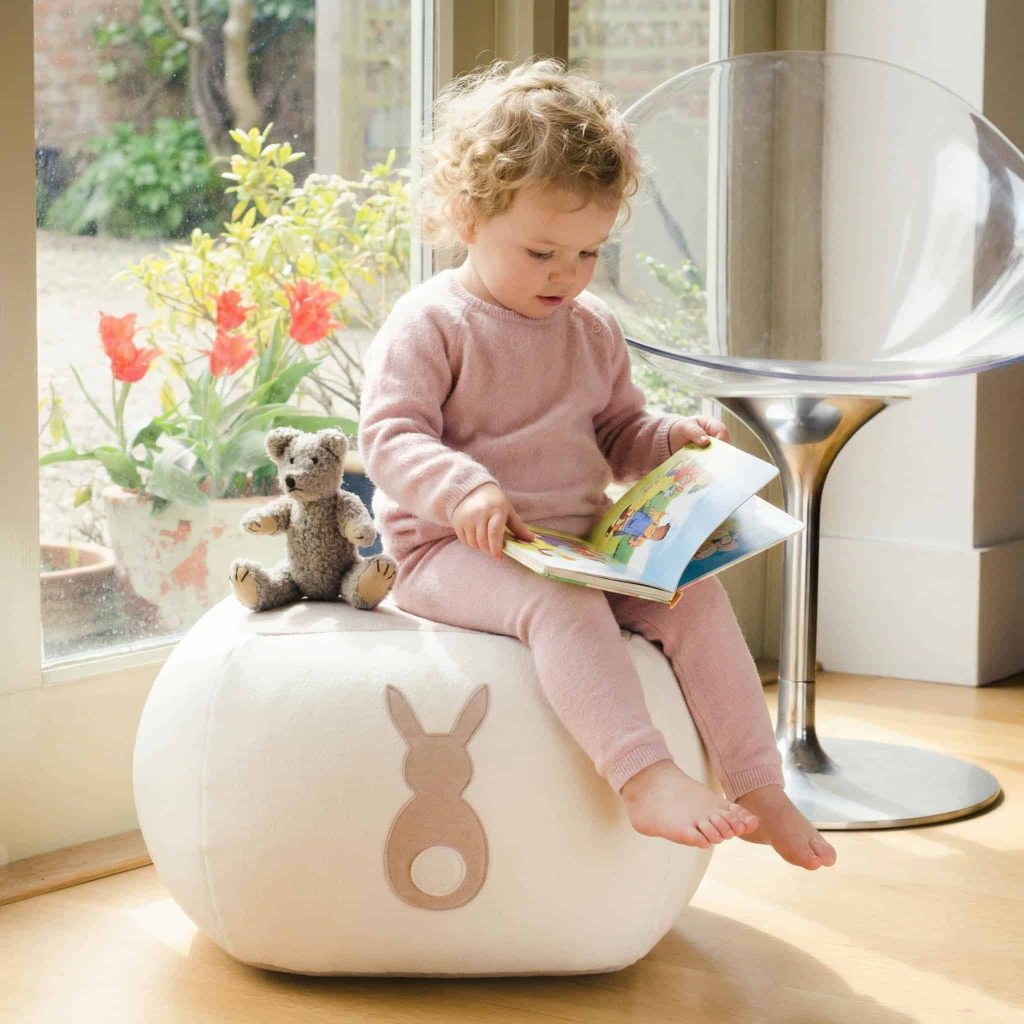 Bunny Beanbag with toddler sitting reading a book